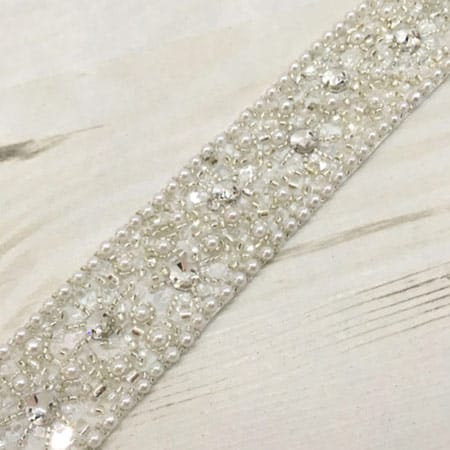 Hand beaded encrusted diamante and pearl belt on a wide ribbon
